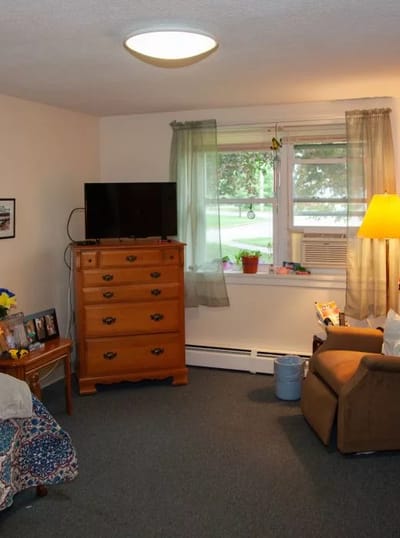 Cozy interior room with furniture and television