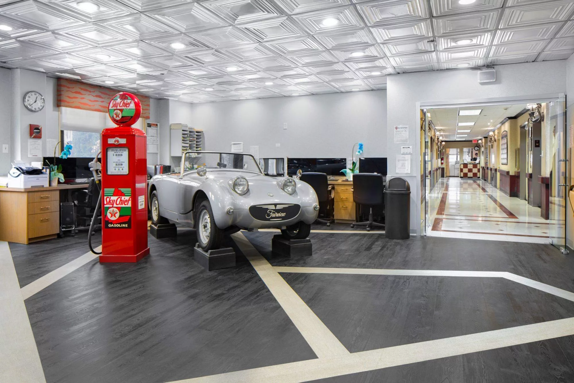 Interior view of the common area with a vintage car display