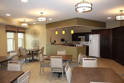 Bright dining room with tables and chairs