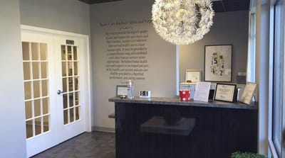 Reception area with decorative lighting and welcoming decor