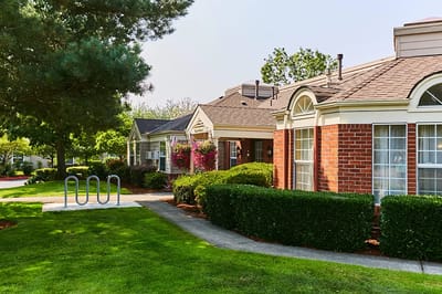 Exterior view of residential buildings with gardens