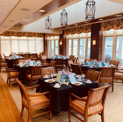 Dining area set for a meal with elegant decor