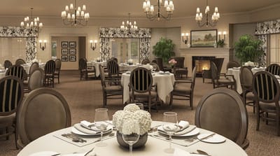 Elegant dining room setup in a senior living facility