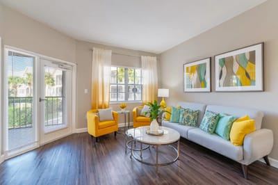 Modern living room with bright decor and natural light