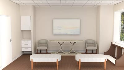 Bright interior room with seating area and artwork