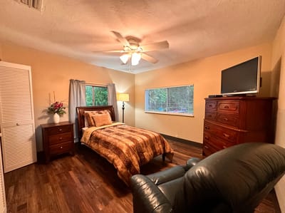 Cozy bedroom with a bed and furniture