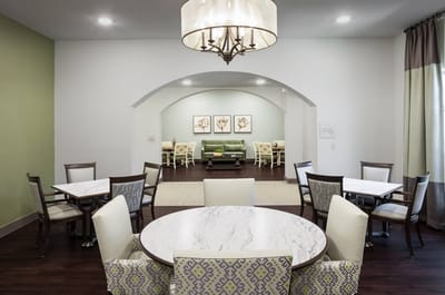 Bright common area with tables and seating