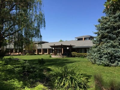 Exterior view of Friends House with green space