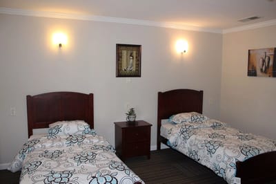 A cozy shared bedroom in the facility