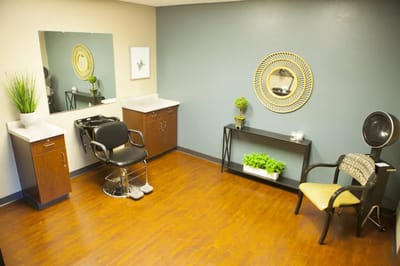 Brightly lit hair salon in the facility