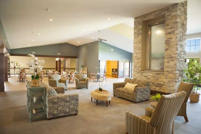 Bright common area with comfortable seating and decor