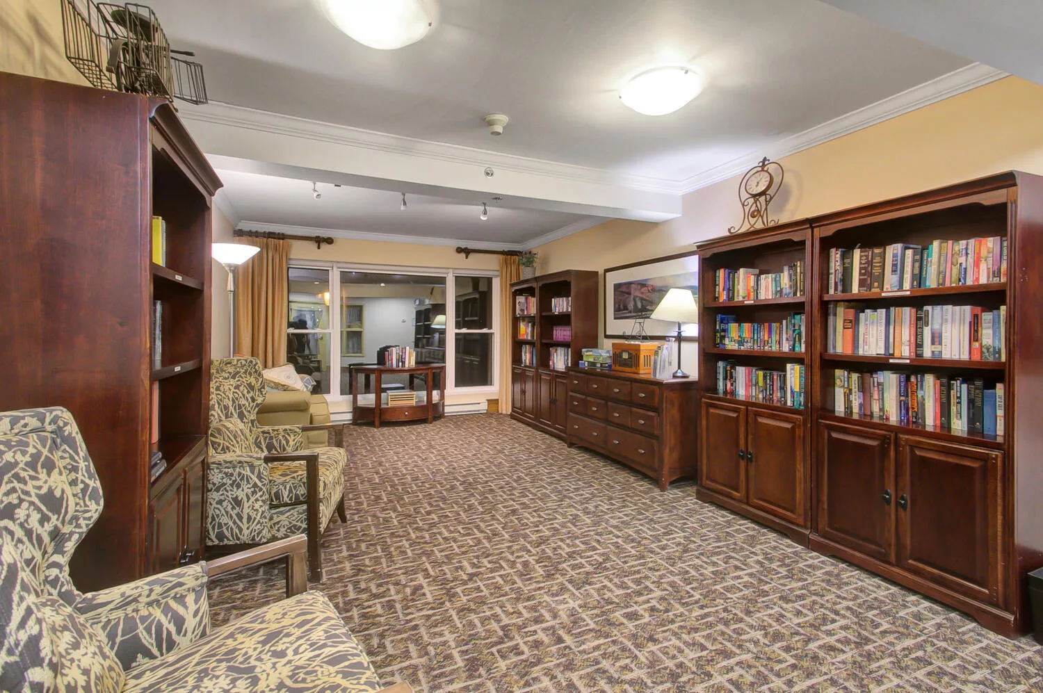 Interior common area with bookshelves and seating