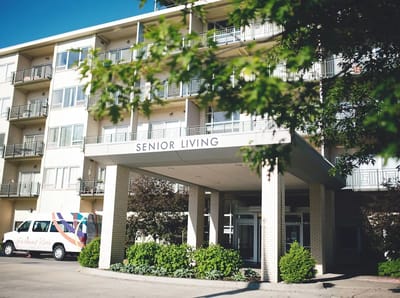 Exterior view of a senior living facility with entrance
