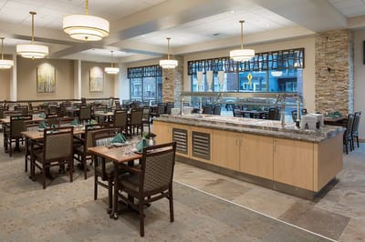 Dining room with tables and a buffet area
