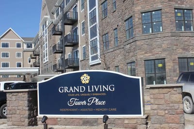 Exterior sign of Grand Living At Tower Place