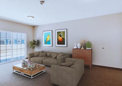 Brightly decorated common area with comfortable seating