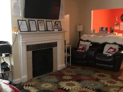 Cozy living room area with comfortable seating and decorations