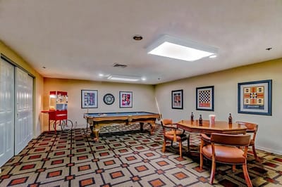 Common area with a pool table and seating