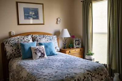 Cozy resident bedroom with natural light