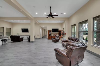 Bright common area with seating and decor