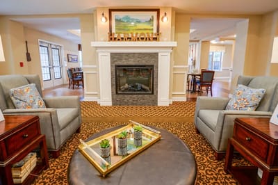 Cozy common area with comfortable seating and a fireplace