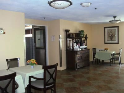 Interior view of a dining area with tables and decor