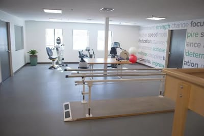 Interior view of a therapy room with equipment