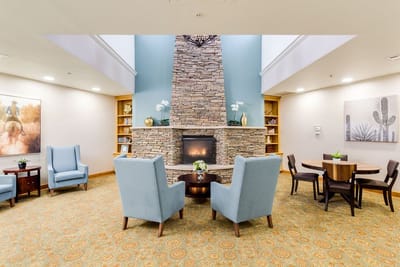 Common area lounge with seating and fireplace