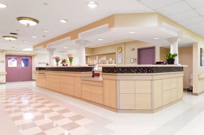 Reception area with a front desk and seating