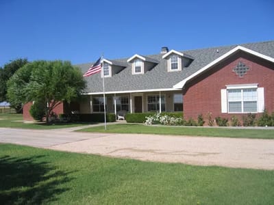 Exterior view of Heartland House with American flag