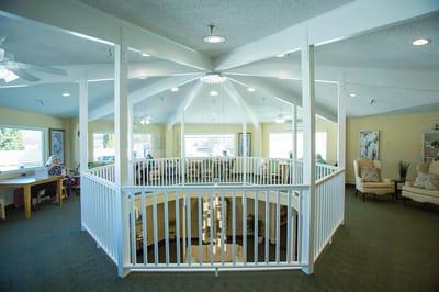 Bright interior common area with seating and decor
