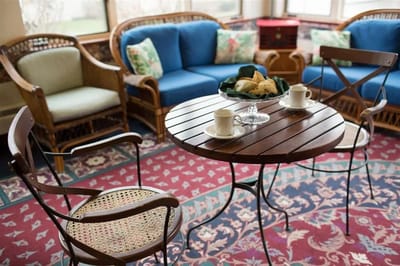 Cozy common area with seating and refreshments