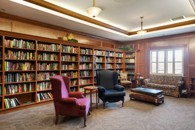 Interior view of a cozy library in a nursing home