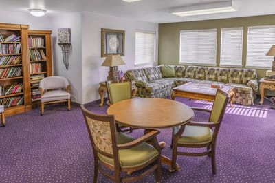 Common area with seating and bookshelves