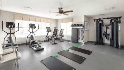 Interior view of a fitness room with exercise equipment