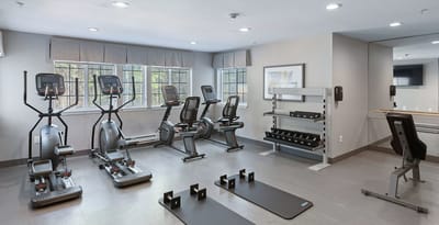 Modern fitness room with exercise equipment