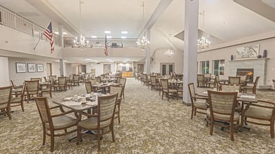Interior view of the dining room with tables and chairs
