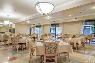 Dining area with tables set for meals