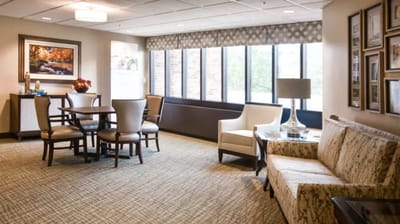 Bright common area with seating and artwork