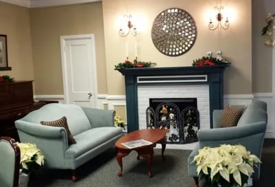 Cozy common area with seating and festive decor