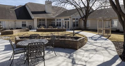 Outdoor patio area with seating and pathways