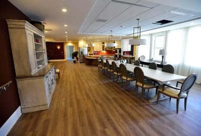 Dining area with table and chairs in a spacious interior