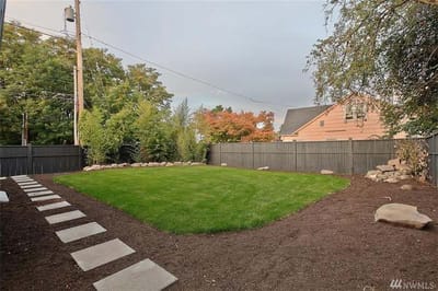 Well-maintained outdoor space with grass and pathways