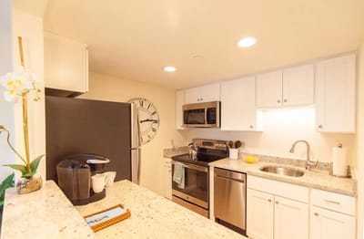 Bright interior kitchen with modern appliances and decor