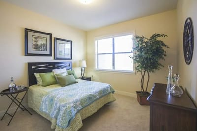 Cozy resident room with bed and decor