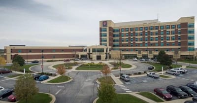 Exterior view of the facility with parking area