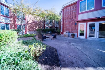 Outdoor seating area with landscaping
