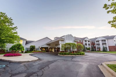 Exterior view of Independence Village entrance and landscaping