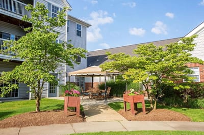 Outdoor seating area with landscaped garden
