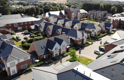 Aerial view of a senior living community with houses